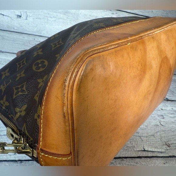 Louis Vuitton Alma Brown Canvas Monogram Leather Handbag - Picture 11 of 16